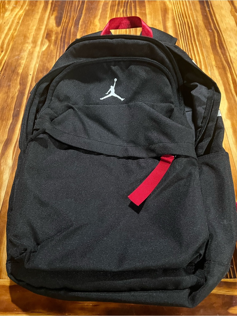 Jordan Black Backpack with Red Accent Strap and White Logo